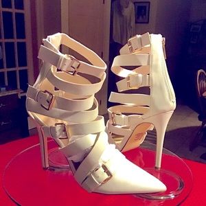 Ladies Heels With 4 Buckles and 8 Straps. These Shoes Zipper Up The Back